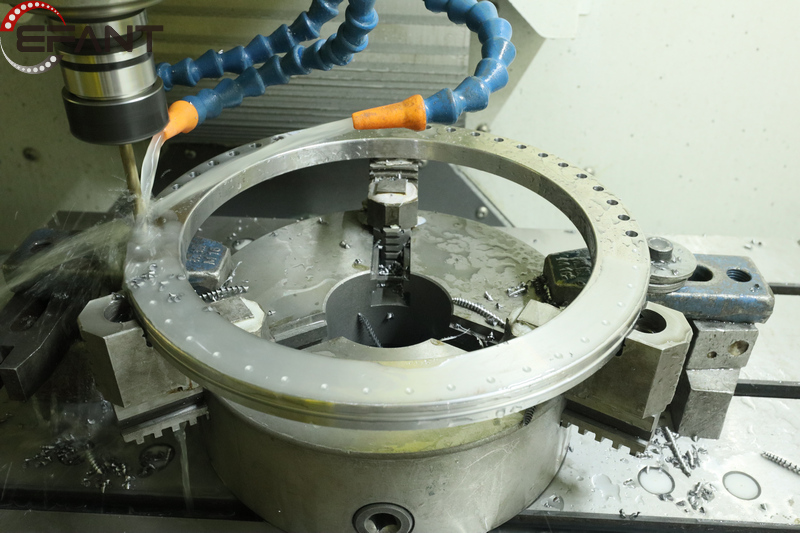 The 100 sets of YRT200 rotary table bearings we have prepared are currently being drilled