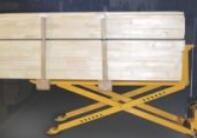 Pallet truck lifts load to work height