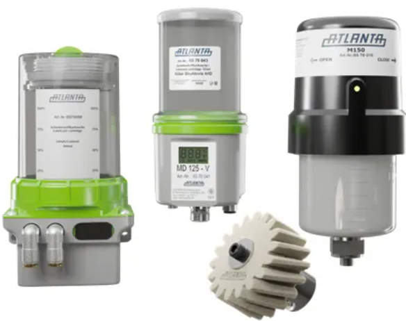 Describe the differences between manual and automatic lubrication systems. What are the key advantages of an automatic lubrication system?